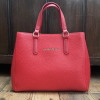 Harnessing the Power of Red with a Valentino Handbag